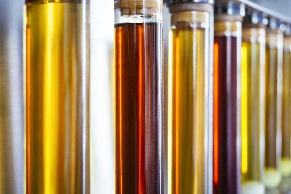 used oils in containers, highlighting the importance of proper storage and recycling